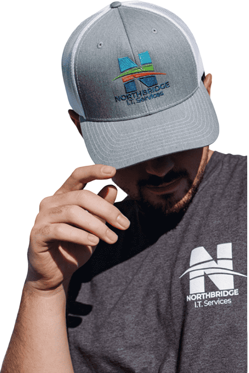 Northbridge IT Services technician wearing a gray and white NorthBridge hat